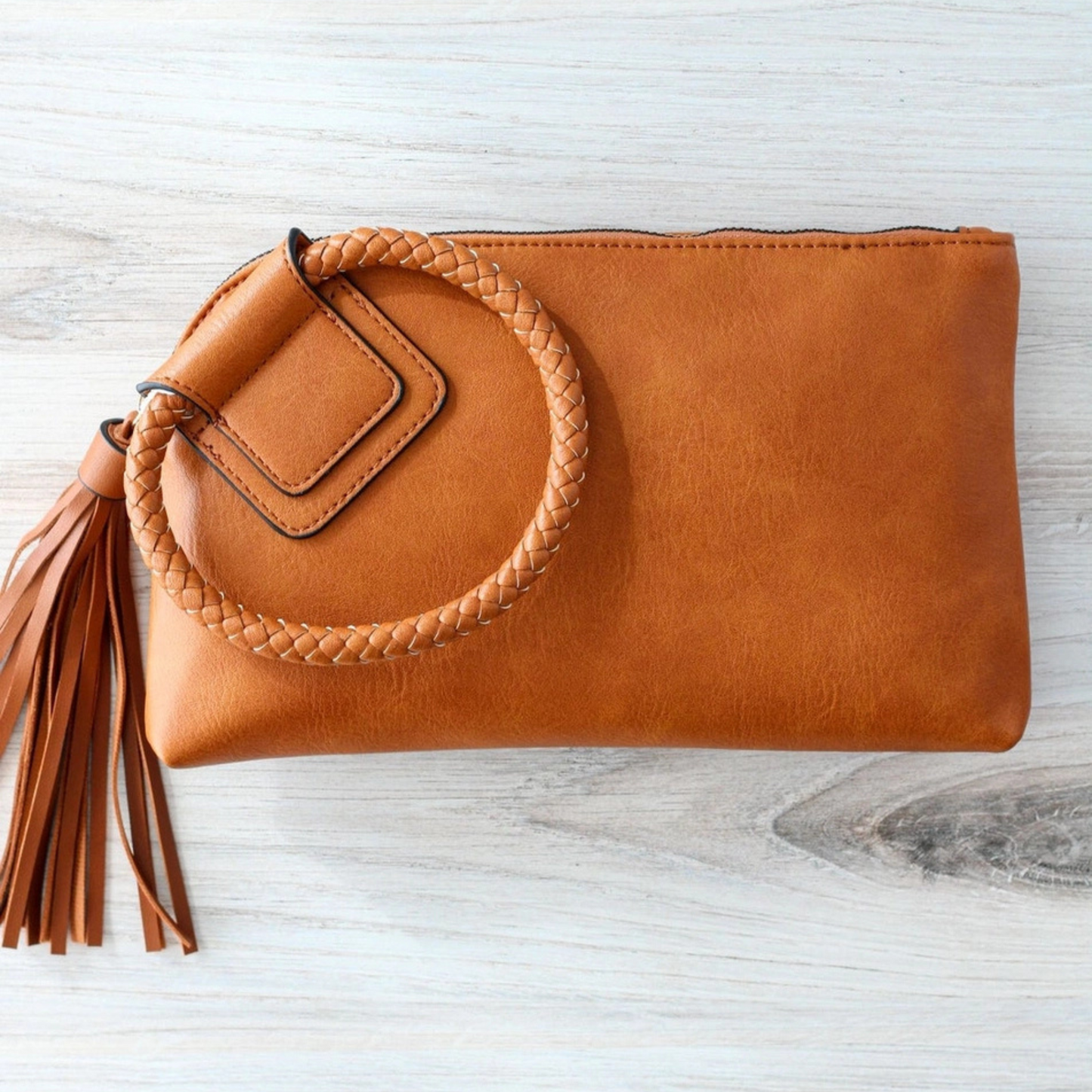 brown tassel wristlet and clutch, brown tassel wristlet, brown tassel clutch, vegan leather accessory, brown wristlet, brown clutch, wristlet, clutch, boutique style, boutique accessory